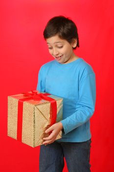 Cute boy with a christmas gift