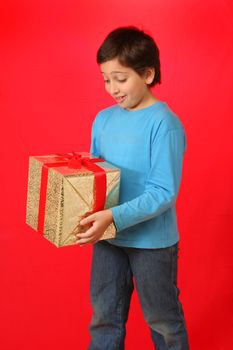 Cute boy with a christmas gift