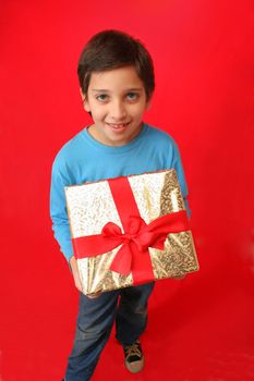 Cute boy with a christmas gift