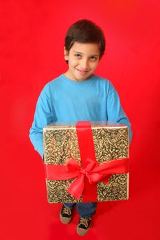 Cute boy with a christmas gift