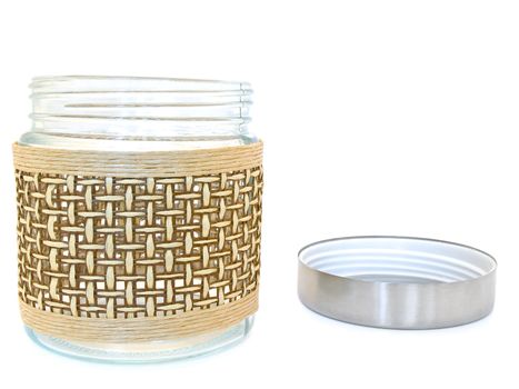 open glass jar against the white background