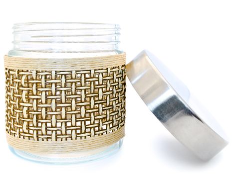 open glass jar against the white background