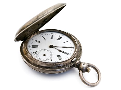  closed old silver pocket watch on a white background 