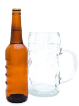 Single bottle of the beer and glass against the white background