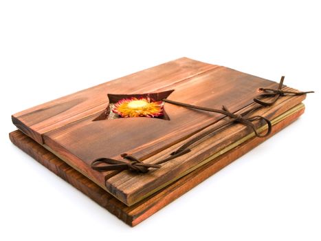 ancient wooden book against the white background