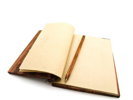 open notebook with pen in ancient style