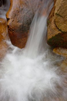 an image of a beautifull river in autumn