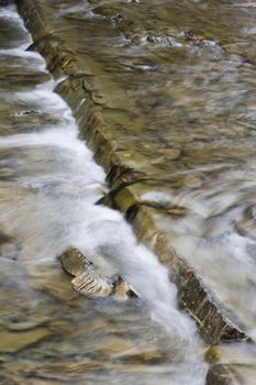 an image of a beautifull river in autumn