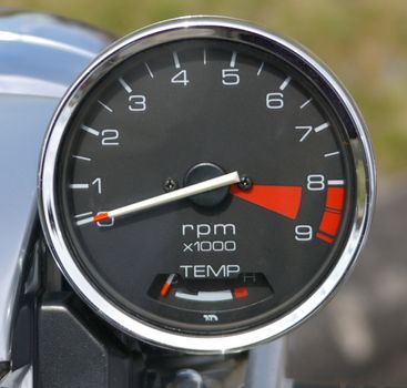 A closeup of a motorcycle RPM gauge.