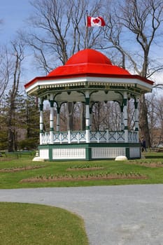 A historic bandstand with the flag flying high.