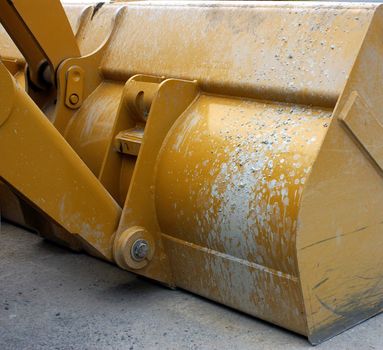 A back view of a backhoe or loader bucket.