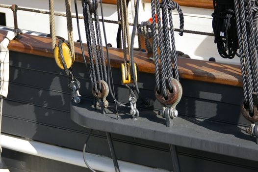 A view of blocks and rigging on a tall ship / sailing ship.