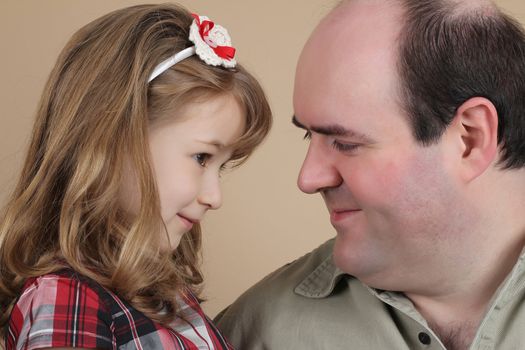 Portrait of a beautiful girl and her father
