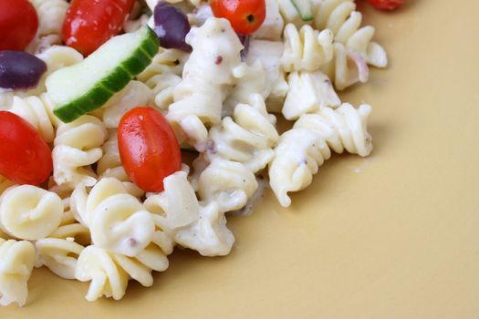 Cold Pasta Salad with tomatoes, cucumbers and olives