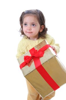 Cute little girl with a christmas present