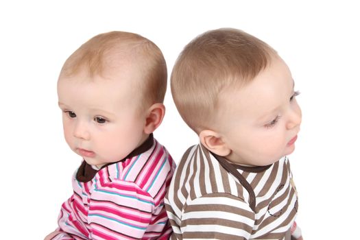 Baby boy and girl wearing striped clothing