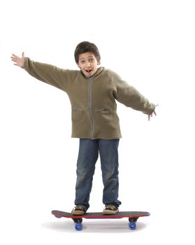 Cool boy skateboarding. Full boy, white background. More pictures of this model at my gallery