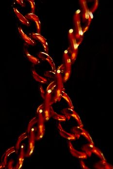 crossed chains with black background
