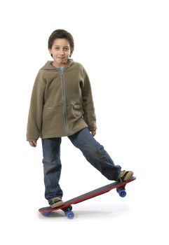 Cool boy skateboarding. Full boy, white background. More pictures of this model at my gallery