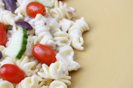 Cold Pasta Salad with tomatoes, cucumbers and olives