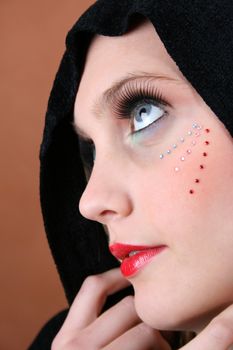 Female model with blue eyes wearing a scarf