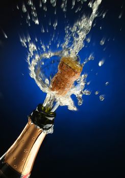 Champagne splash. Bottle and cork, celebration time 