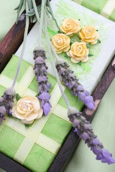 Soap Crate gift set wrapped in green, decorated with roses