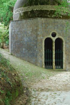 detail of a old islamic house inside of the jungle