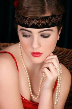 Beautiful young female in 1920 style attire