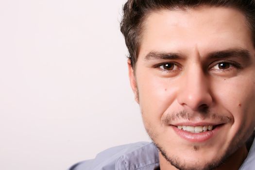 Male model in studio against white wall