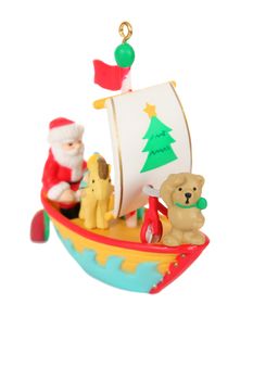 Teddy bear and father christmas in a boat christmas decoration