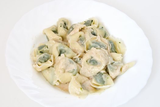 Typical dish of Ligurian cooking: paste stuffed like ravioli with walnut sauce