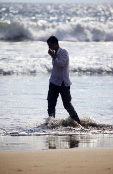 Lonely the man on a coast of ocean