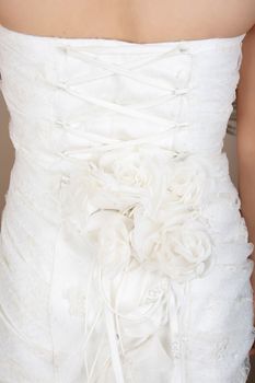 Floral and lace detail on the back of wedding dress