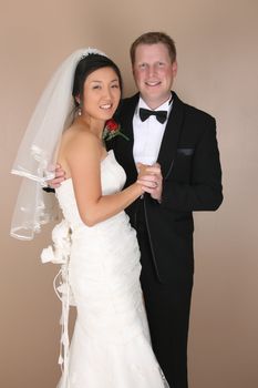 Beautiful couple on their wedding day in traditional attire 