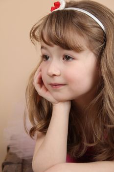 Beautiful little girl wearing a head band