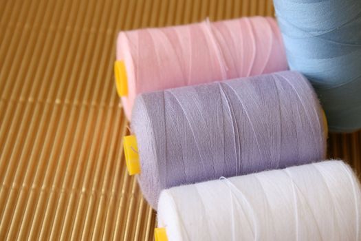 Cotton in various colors of white, purple, pink and blue