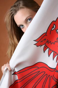 Beautiful young female model with a Welsh Flag