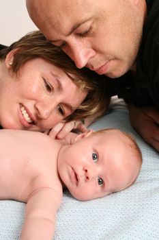 Fathe, Mother and Baby boy on a white background