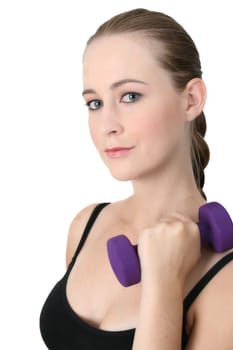 Young blonde exercising with light purple weights 