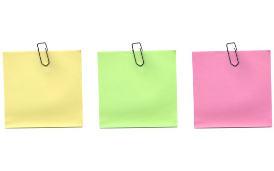 Yellow green and pink postit isolated over a white background
