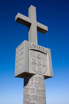 Close up of a stone cross at cape Cross Bay, skeleton Coast Namibia