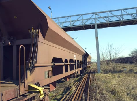 big wagon at railway tracks