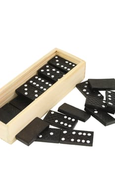 a box of domino tiles and scattered tiles isolated