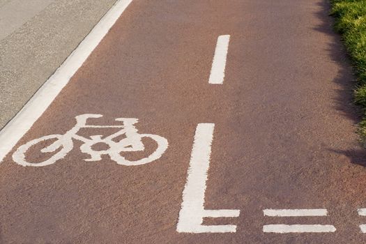 a painted cycle on the pavement indicating a cycle lane