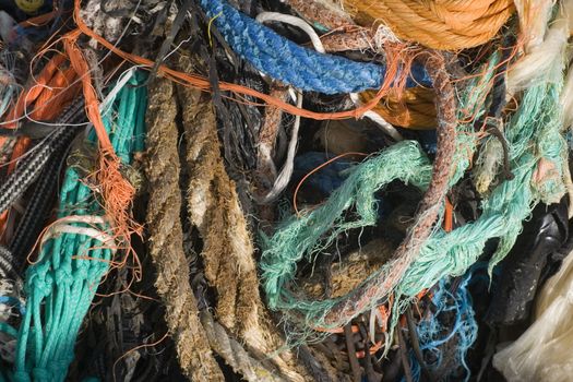 A pile of rope and fishing nets, all tangled together