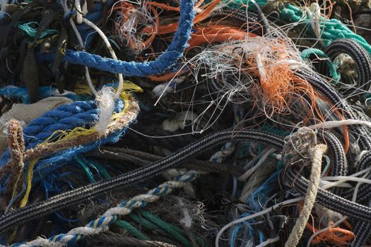 A pile of rope and fishing nets, all tangled together