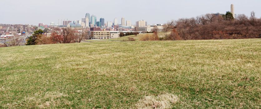 A very large panoramic view of all of the Kansas City skyline.  