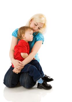 Mother comforting sick son's sitting isolated on white