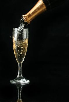 Pouring a champagne flute for celebration time